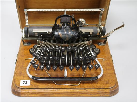 A Blickensderfer typewriter, in original oak travelling case